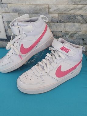 Nike Women's White High-Top Sneakers with Pink Swoosh
